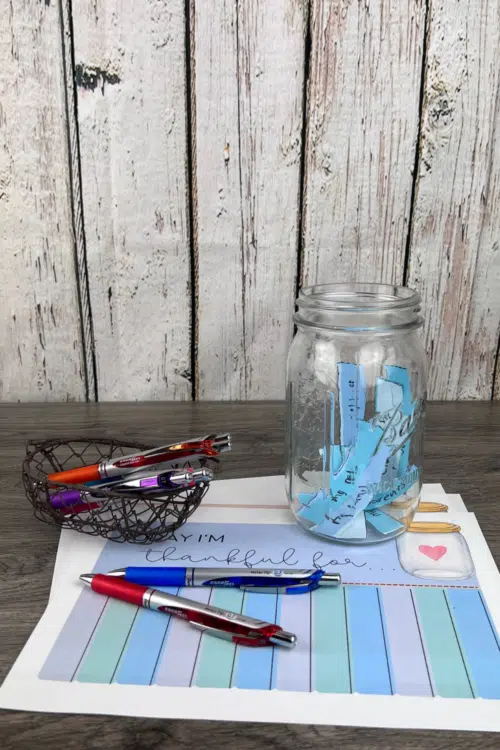 Family Gratitude Jar - glass jar with ink pens and strips of paper for listing thankfulness