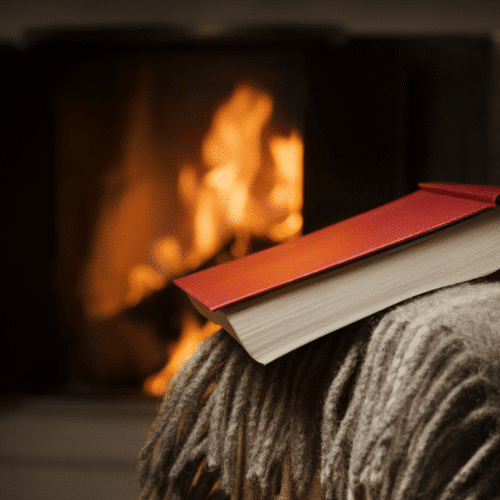 book in front of fireplace - winter homeschooling 